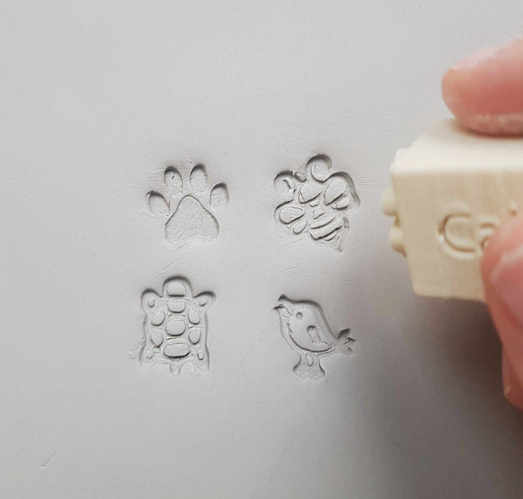tampon animaux poterie