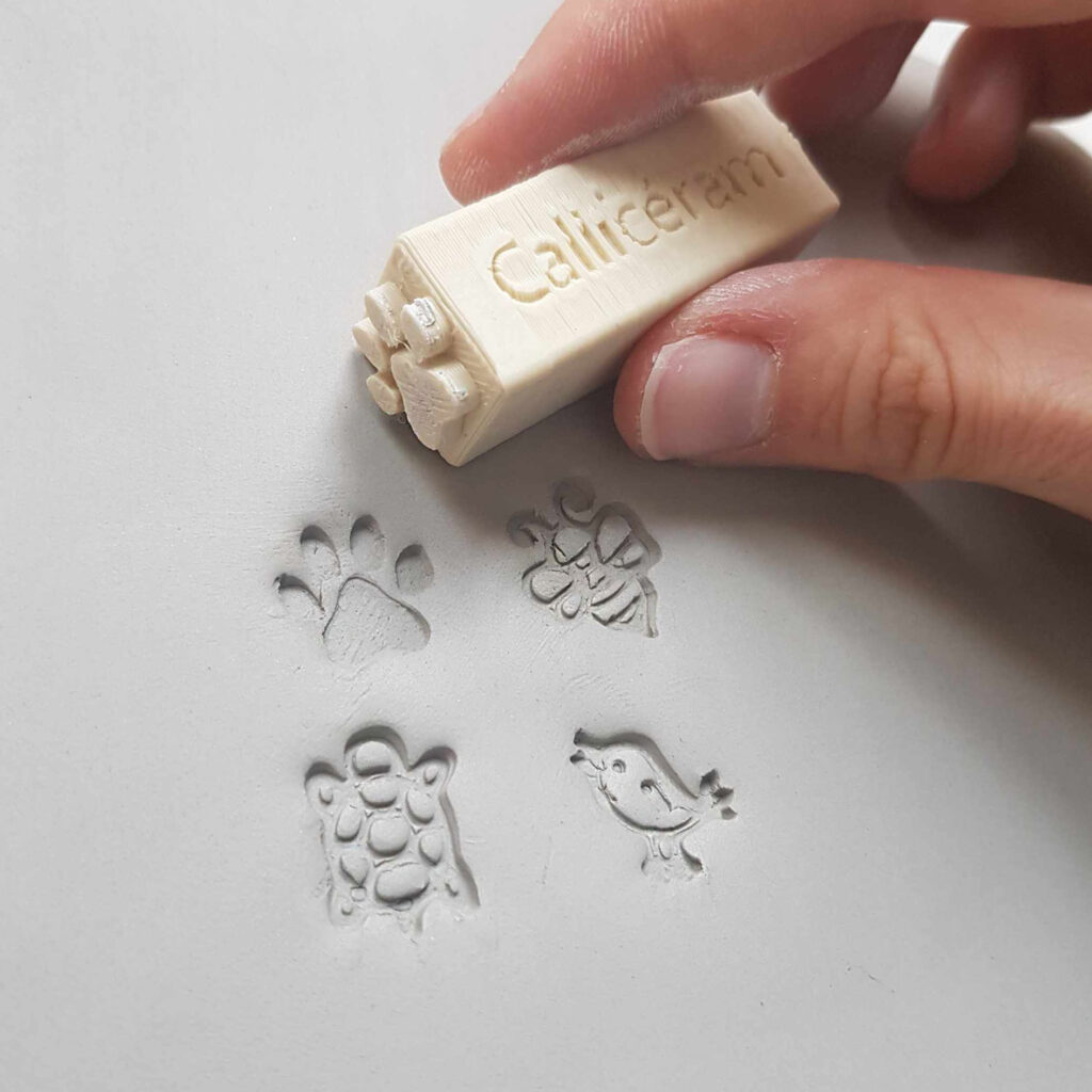 tampon animaux poterie