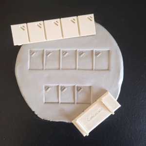 Tampon à plaque de tests d'émaux