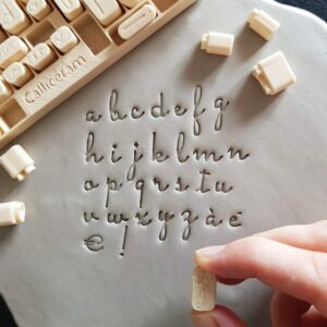tampons alphabet cursive